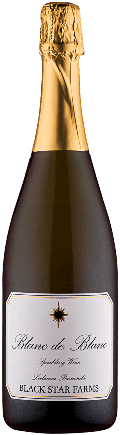 Sparkling white wine bottle with black star label, perfect for a farmhouse celebration.