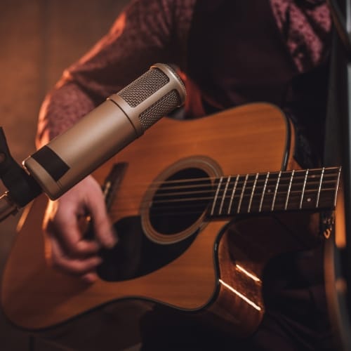 Live Music 1 Man playing a guitar